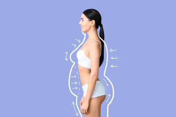 image of woman experiencing fat reduction treatment Swinton