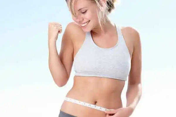 woman happy after fat reduction treatment Swinton